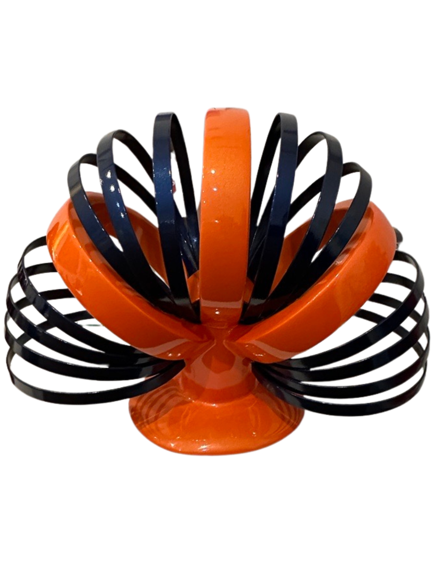An Iron Sculpture With Both Orange And Dark Blue By Artist Ilse De Manzanarez.