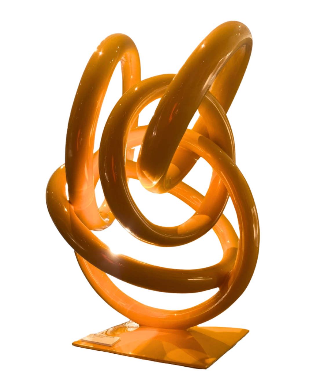 A Sculpture Of A Yellow Spiral By Ilse Ortiz De Manzanarez